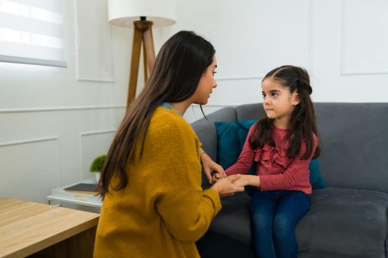 A child with a uncertain expression, symbolizing the potential impact of custody battles on children